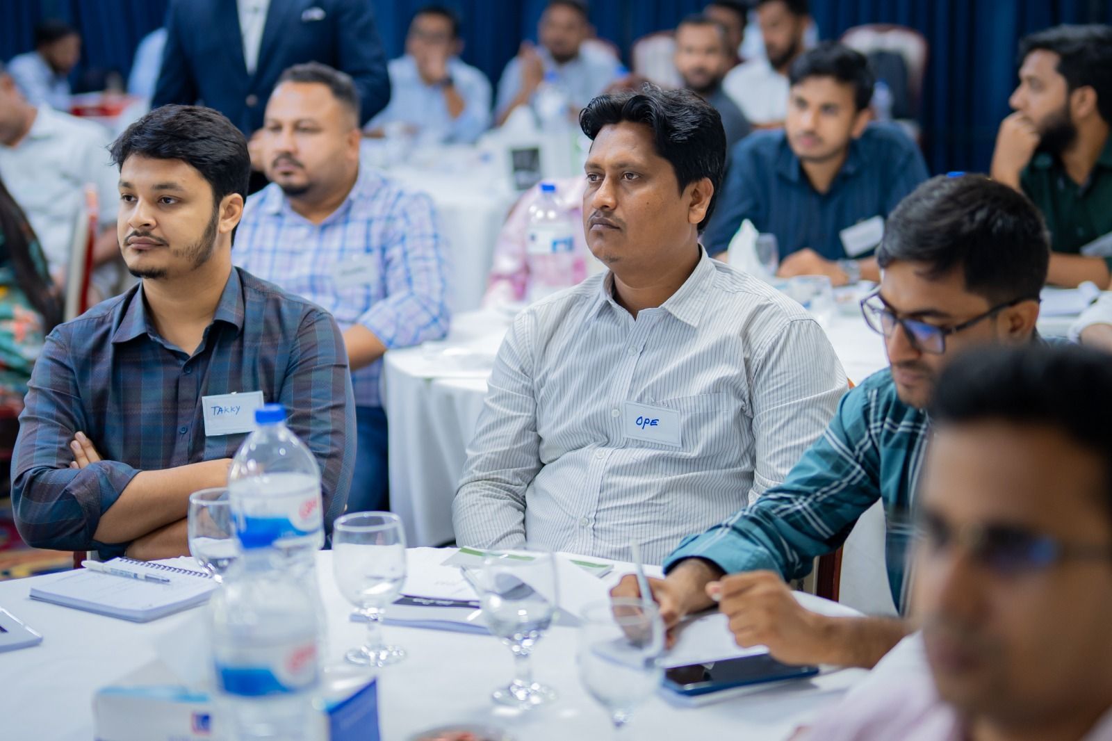 Participants listening during a leadership session